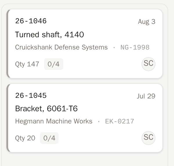 Close-up of a single job card showing part, quantity, due date and a HOT flag